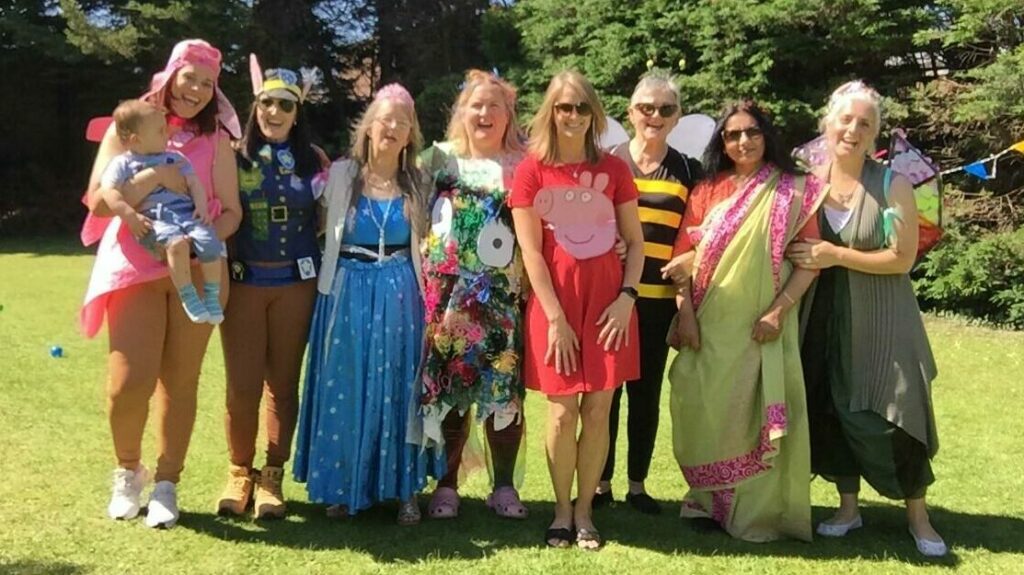 Staff Photo in Fancy Dress at Mill Grove Preschool in South Woodford